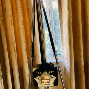 Furla women’s black metropolis cat bag